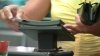 Lawmakers look at trade-offs over ‘swipe fees' that generate rewards points