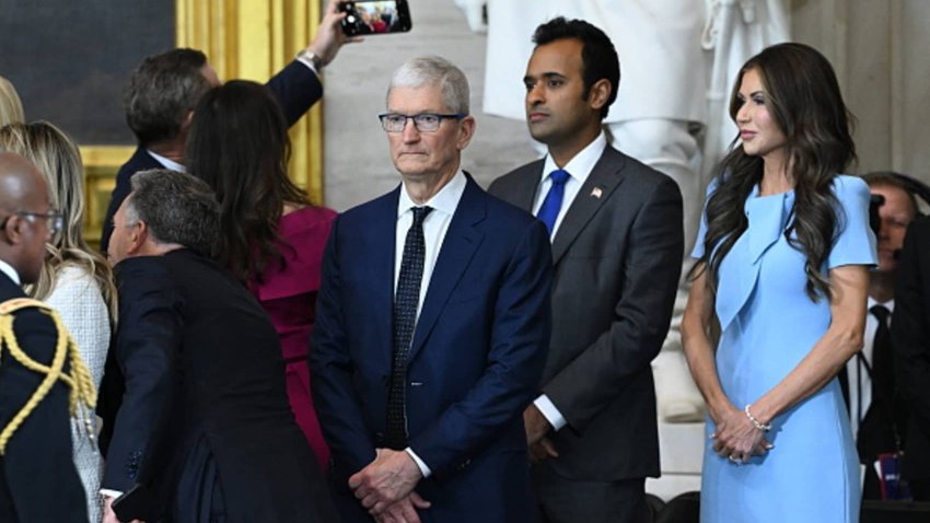 (L-R) Apple CEO Tim Cook, Vivek Ramaswamy and Secretary of Homeland Security Kristi Noem attend the inauguration ceremony before Donald Trump is sworn in as the 47th U.S. President in the U.S. Capitol Rotunda in Washington, D.C., on Jan. 20, 2025.