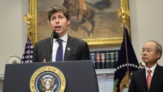OpenAI CEO Sam Altman speaks next to SoftBank CEO Masayoshi Son after U.S. President Donald Trump delivered remarks on AI infrastructure at the Roosevelt Room in the White House in Washington on Jan. 21, 2025.