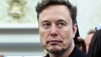 Elon Musk looks on as U.S. President Donald Trump meets South African President Cyril Ramaphosa in the Oval Office of the White House in Washington, D.C., U.S., May 21, 2025.