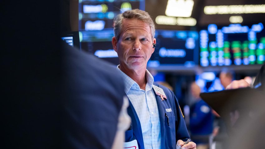 Traders work on the floor of the New York Stock Exchange on May 28, 2025.