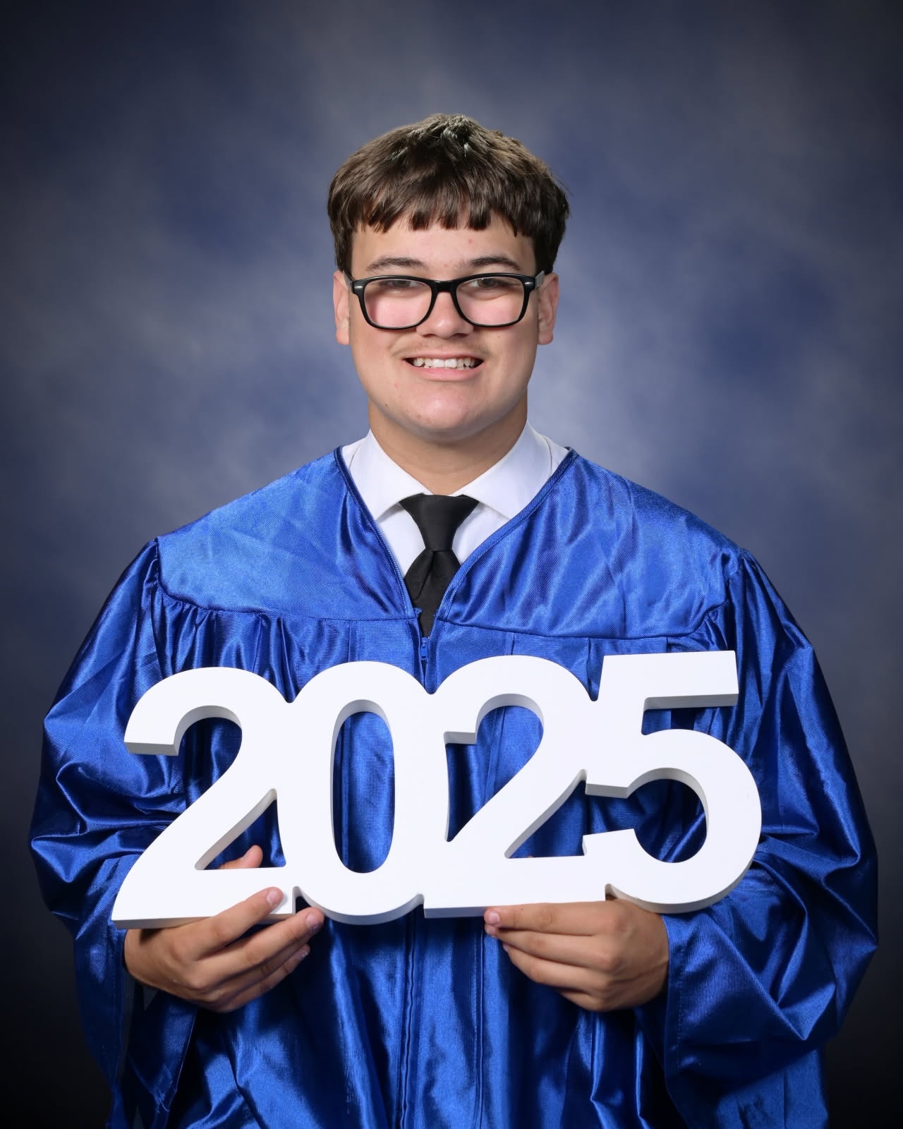 My handsome and sweet grandson Aiden Teeters Weikel. Graduating from Troy<br />
High School. I am so proud of him!