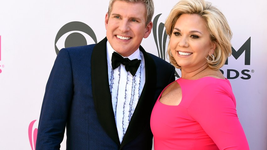 FILE – Todd Chrisley, left, and his wife, Julie Chrisley, pose for photos at the 52nd annual Academy of Country Music Awards on April 2, 2017, in Las Vegas. Reality TV star Julie Chrisley’s sentence for bank fraud and tax evasion has been thrown out by federal appeals judges, who have ordered a lower court to redo her punishment, Friday, June 21, 2024.