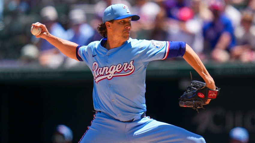 Texas Rangers pitcher Jacob deGrom throws a pitch to the Seattle Mariners during the first inning of a baseball game Sunday, May 4, 2025, in Arlington, Texas. (AP Photo/Julio Cortez)