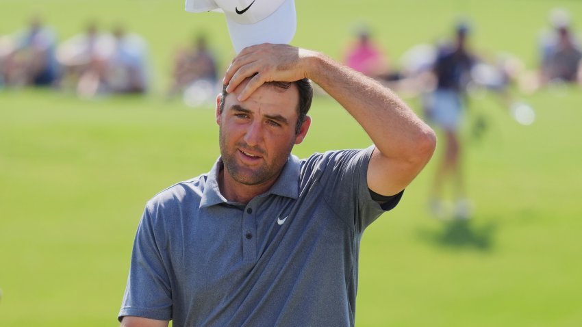 Scottie Scheffler reacts after finishing on the 18th hole during the final round of the Charles Schwab Challenge golf tournament at Colonial Country Club in Fort Worth, Texas, Sunday, May 25, 2025. (AP Photo/LM Otero)