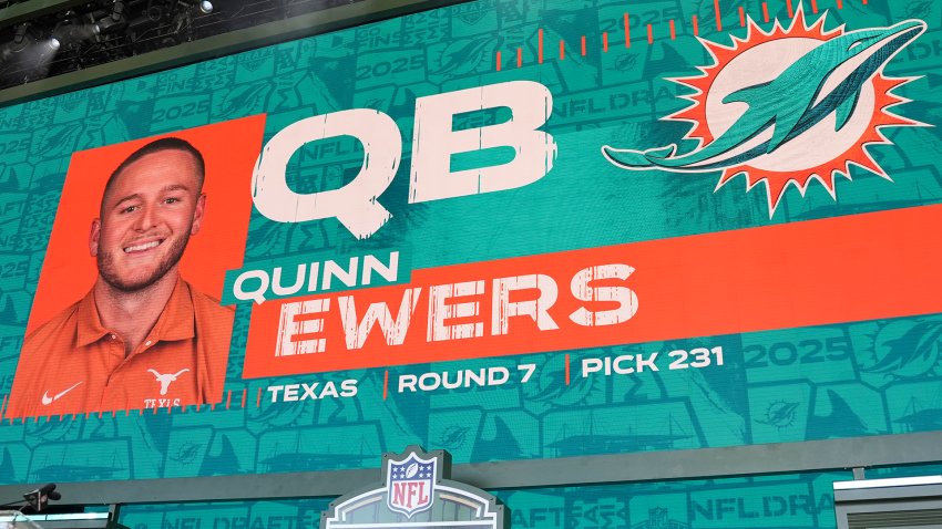 GREEN BAY, WISCONSIN – APRIL 26: A screen shows Texas quarterback Quinn Ewers after being selected by the Miami Dolphins with the 231st overall pick during the during the third day of the 2025 NFL Draft on April 26, 2025 in Green Bay, Wisconsin.