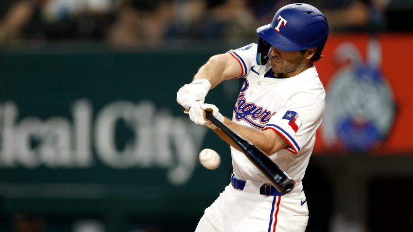 ARLINGTON, TX – MAY 28: Josh Smith #8 of the Texas Rangers singles against the Toronto Blue Jays during the first inning at Globe Life Field on May 28, 2025 in Arlington, Texas.