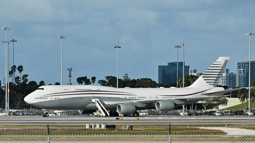 A Qatari Boeing 747 sits on the tarmac of Palm Beach International airport after President Donald Trump toured the aircraft on Feb. 15, 2025.