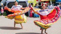 Natalie Beltran, 16, left and sister Analie Beltran, 11, with the Ballet Folklorico Los Mirasoles perform a traditional Mexican dance at El Concilio's annual Cinco De Mayo Festival at the Weber Point Events Center in downtown Stockton on May 5, 2024.
