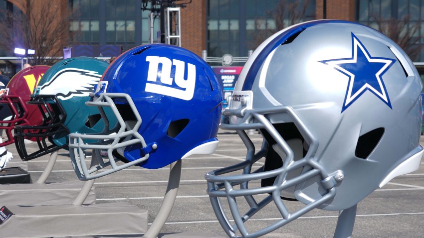 Feb 27, 2025; Indianapolis, IN, USA; NFC East helmets of the Dallas Cowboys, New York Giants, Philadelphia Eagles and Washington Commanders at the 2025 NFL Scouting Combine Experience at Lucas Oil Stadium. Mandatory Credit: Kirby Lee-Imagn Images