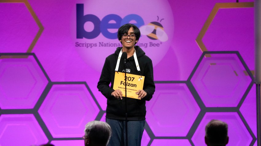 May 29, 2025; Oxon Hill, MD, USA; Faizan Zaki, speller 207, from Dallas, Texas, representing Dallas Sports Commission, spells the word éclaircissement to win the 2025 Scripps National Spelling Bee Finals at the Gaylord National Resort & Convention Center in Oxon Hill, MD, on May 29, 2025. Mandatory Credit: Jack Gruber-USA TODAY