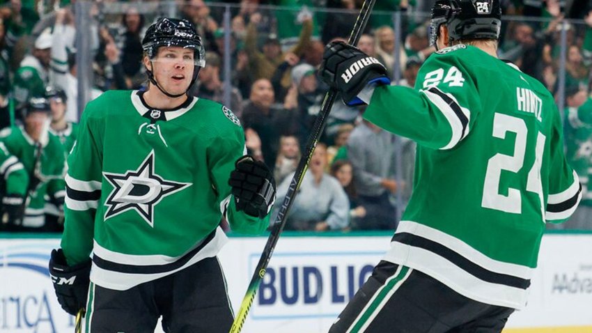 Dallas Stars defenseman Miro Heiskanen (4) celebrates his goal with center Roope Hintz (24) during the third period of a NHL game against the Winnipeg Jets at the American Airlines Center, Monday, Oct. 17, 2022 in Dallas. The Stars defeated the Jets 4-1.