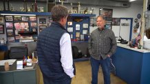 NBC 5 senior investigative reporter Scott Friedman, left, talks with car dealer Jerry Smith, right.