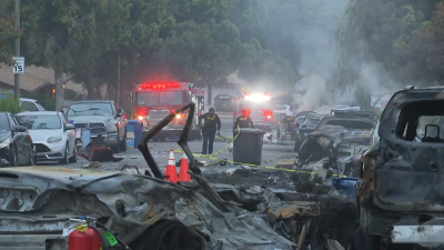 San Diego neighborhood evacuated after small plane crashes into military homes