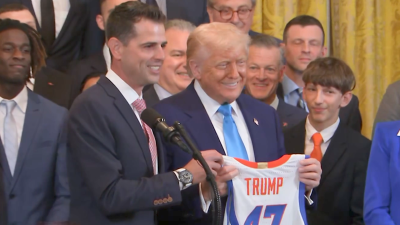 NCAA champions Florida Gators give Trump a ‘47' jersey during White House visit