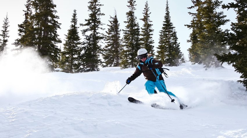 Skiers on a slope in Breckenridge, near Vail, Colorado.