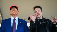 Elon Musk speaks with U.S. President-elect Donald Trump as they watch the launch of the sixth test flight of the SpaceX Starship rocket on November 19, 2024 in Brownsville, Texas.