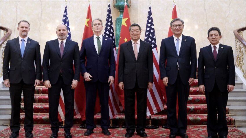 Delegations of China and the U.S. pose for a group photo prior to the first meeting of the China-U.S. economic and trade consultation mechanism in London, Britain, June 9, 2025.