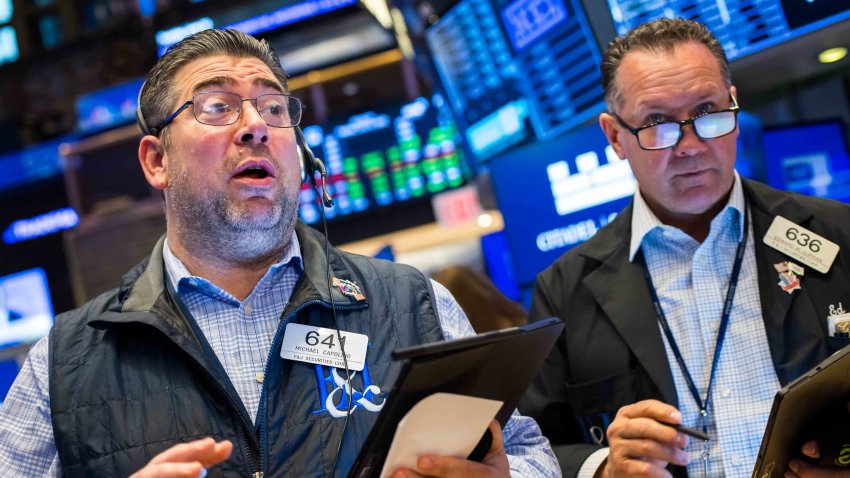 Traders work on the floor of the New York Stock Exchange on June 10, 2025.
