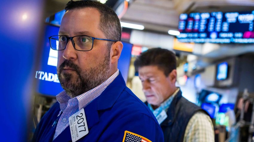 Traders work on the floor of the New York Stock Exchange on June 10, 2025.