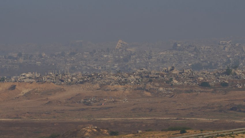 Destroyed buildings in the Gaza Strip are seen from southern Israel, Sunday, June 1, 2025. (AP Photo/Ohad Zwigenberg)