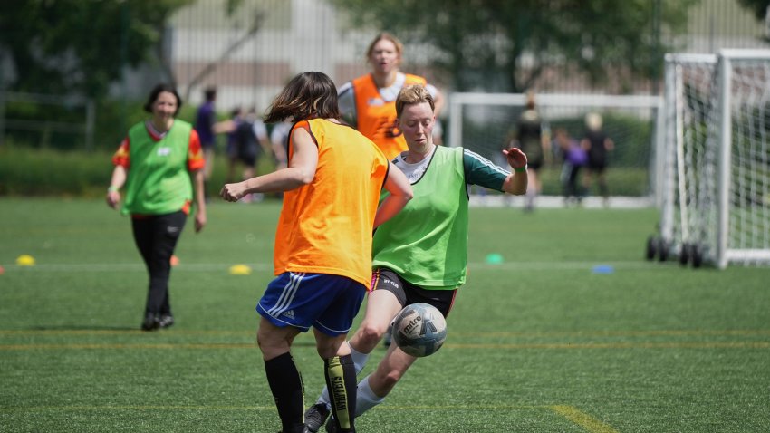 Players in actions during an inclusive six a side soccer friendly tournament in London, Sunday, June 1, 2025.