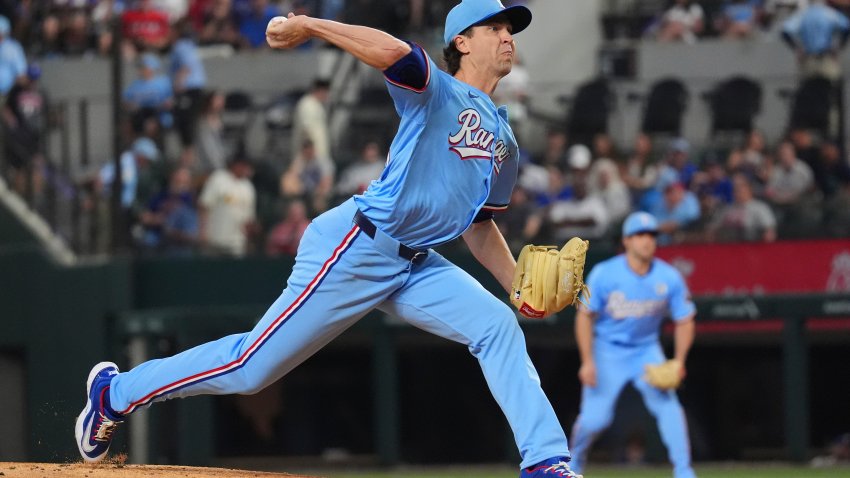 Texas Rangers starting pitcher Jacob deGrom throws during the first inning of a baseball game against the St. Louis Cardinals, Sunday, June 1, 2025, in Arlington, Texas. (AP Photo/LM Otero)
