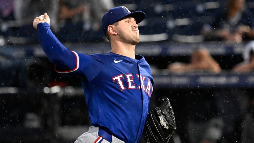Texas Rangers pitcher Tyler Mahle throws during the second inning of a baseball game against the Tampa Bay Rays, Tuesday, June 3, 2025, in Tampa, Fla. (AP Photo/Jason Behnken)