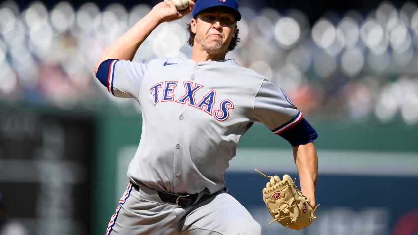 Texas Rangers starting pitcher Jacob deGrom throws during the first inning of a baseball game against the Washington Nationals, Saturday, June 7, 2025, in Washington. (AP Photo/Nick Wass)