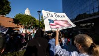 Protesters continue to march and chant in an approximately one-square mile area of downtown Los Angeles in response to a series of immigration raids, on June 11, 2025 in Los Angeles, California.