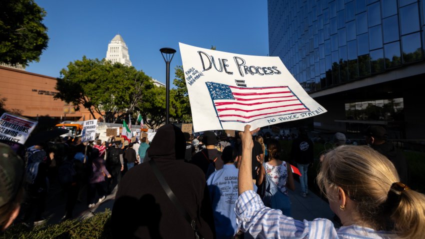 Protesters continue to march and chant in an approximately one-square mile area of downtown Los Angeles in response to a series of immigration raids, on June 11, 2025 in Los Angeles, California.