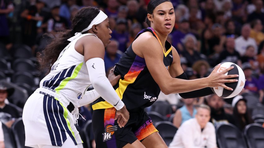 PHOENIX, ARIZONA – JUNE 11: Satou Sabally #0 of the Phoenix Mercury goes to the basket against Arike Ogunbowale #24 of the Dallas Wings during the second half of a WNBA Commissioner’s Cup game at PHX Arena on June 11, 2025 in Phoenix, Arizona. NOTE TO USER: User expressly acknowledges and agrees that, by downloading and or using this photograph, User is consenting to the terms and conditions of the Getty Images License Agreement.  (Photo by Chris Coduto/Getty Images)