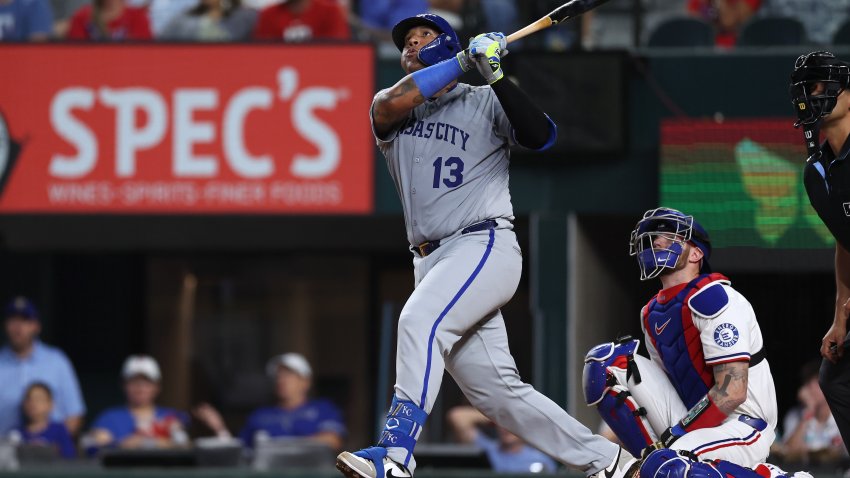 ARLINGTON, TEXAS – JUNE 17: Salvador Perez #13 of the Kansas City Royals hits a solo home run during the sixth inning against the Texas Rangers at Globe Life Field on June 17, 2025 in Arlington, Texas.