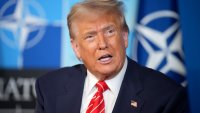 U.S. President Donald Trump speaks to media at the start of the second day of the 2025 NATO Summit on June 25, 2025 in The Hague, Netherlands.