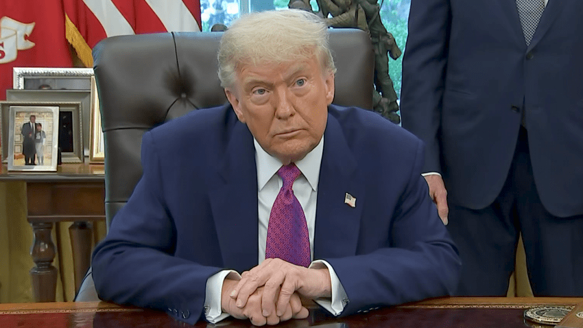 Trump sits in Oval Office