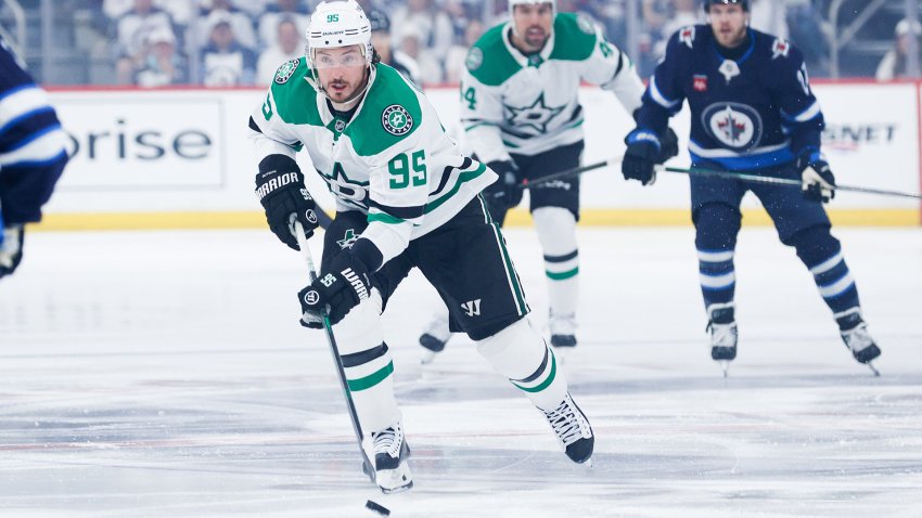 May 7, 2025; Winnipeg, Manitoba, CAN; Dallas Stars forward Matt Duchene (95) skates into the Winnipeg Jets during the first period in game one of the second round of the 2025 Stanley Cup Playoffs at Canada Life Centre.