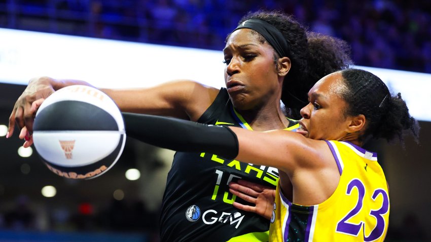 Jun 6, 2025; Arlington, Texas, USA;  Los Angeles Sparks forward Azura Stevens (23) and Dallas Wings center Teaira McCowan (15) go for the ball during the second half at College Park Center. Mandatory Credit: Kevin Jairaj-Imagn Images