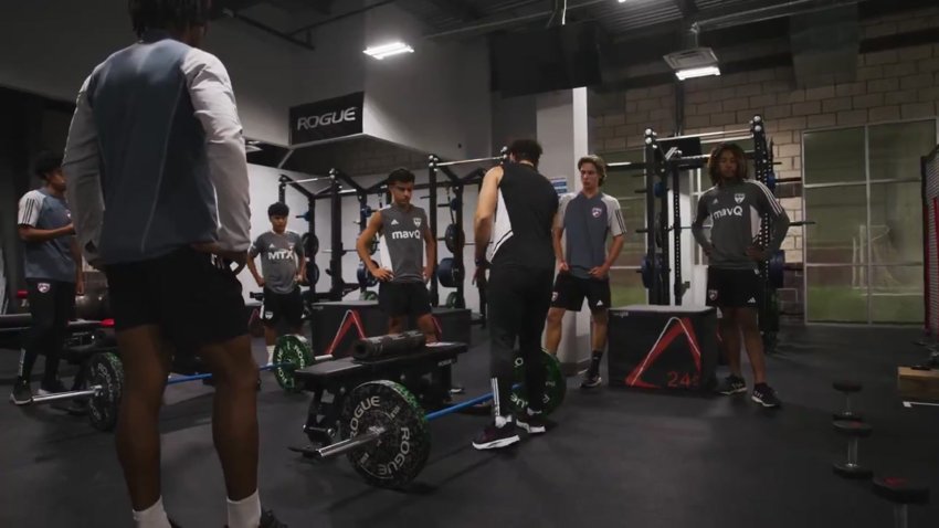 FC Dallas Academy players work out in the gym.