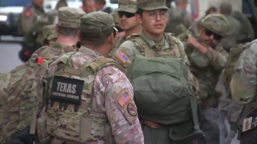 Members of the Texas National Guard deploy in San Antonio.