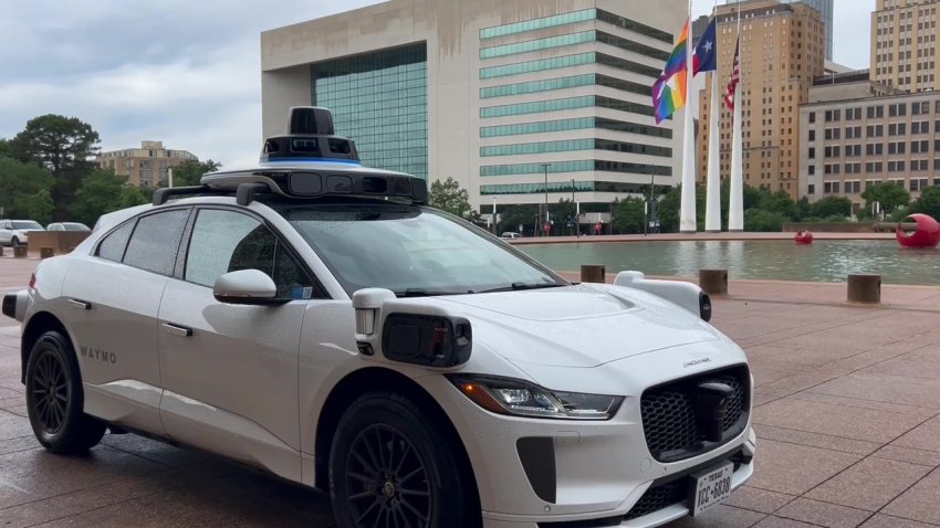 A Waymo demonstration vehicle outside Dallas City Hall, Wednesday, June 11, 2025.