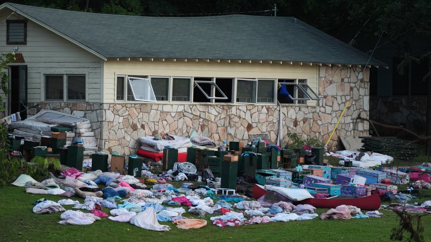 TEXAS, US – JULY 7: Beds, furniture, and personal belongings were seen scattered outside flooded cabins at Camp Mystic on Monday, July 7, 2025, following the devastating flash floods in Kerr County, Texas, that is believed to have killed 27 campers and counselors.