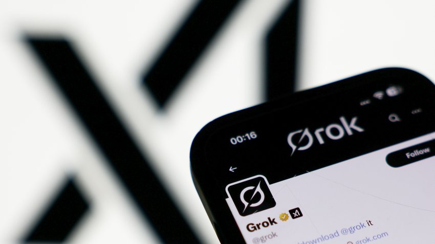 XAI logo dislpayed on a screen and Grok account on X displayed on a phone screen are seen in this illustration photo taken in London, Great Britain on July 9, 2025. (Photo by Jakub Porzycki/NurPhoto via Getty Images)