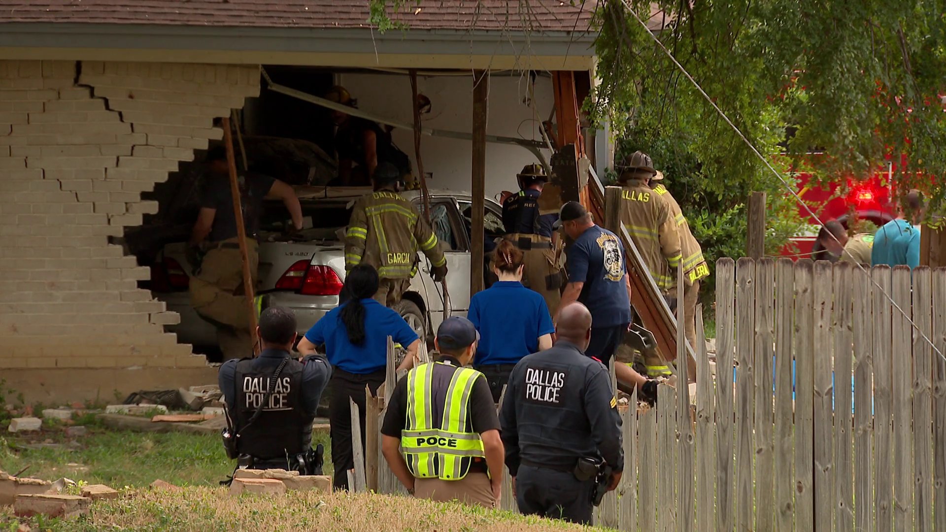 1 dead, 1 critically injured after car crashes into two Dallas homes, police say