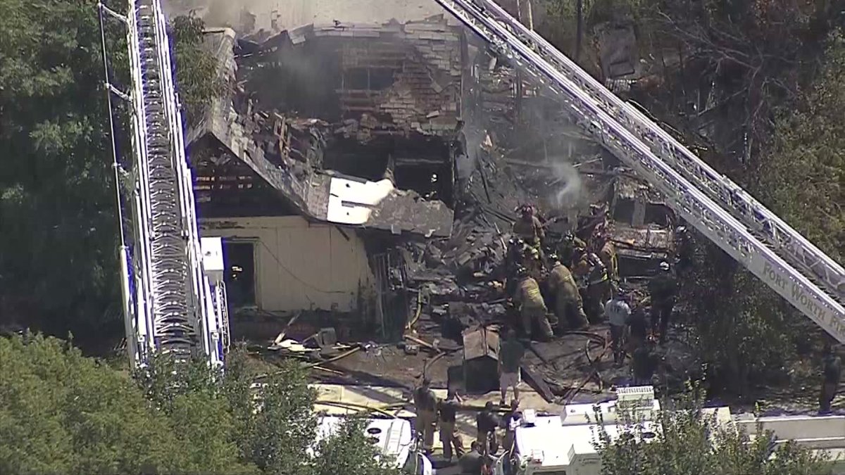 An arrest has been made after a fire injured two firefighters in Fort Worth. Investigators say it was arson, with a suspect now in custody.