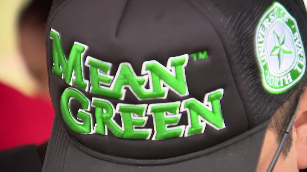 The Mean Green football team wins 11th game, setting a school record and aiming for the championship and playoffs.