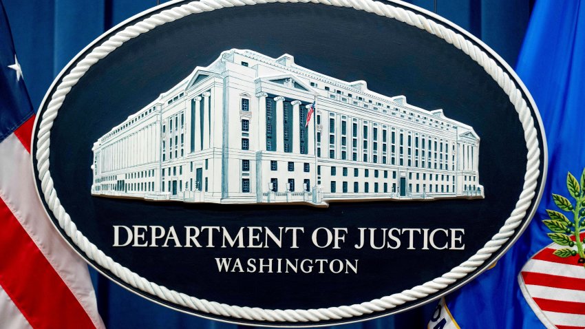 FILE – The Justice Department sign is shown in Washington, Nov. 18, 2022.  (AP Photo/Andrew Harnik, File)