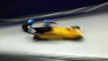 Adam Ammour and Alexander Schaller of Team Germany start the Two-Man Bobsleigh Heat 4 on day 11.