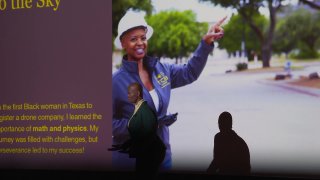 Image of Steffanie Rivers , founder and CEO of TCB Drones, on stage as she speaks to students.