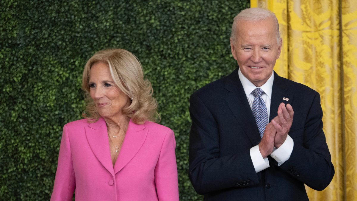 Joe and Jill Biden adopt a pair of black Lab-mix puppies named Boo and Scout