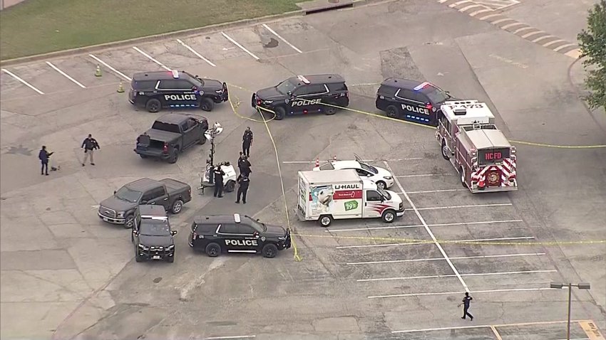 Image of a police presence near Birdville Stadium where a shooting investigation is underway.